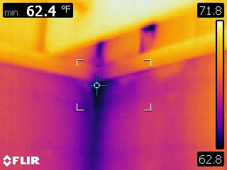 The dark area is moisture intrusion